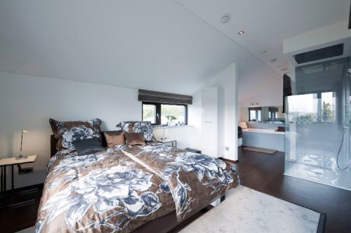 Platz für alle! Exklusiver lichtdurchfluteter Neubau aus dem Hause BIEN ZENKER inkl. Baugrundstück